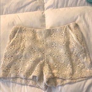 Lace high rise shorts in cream color